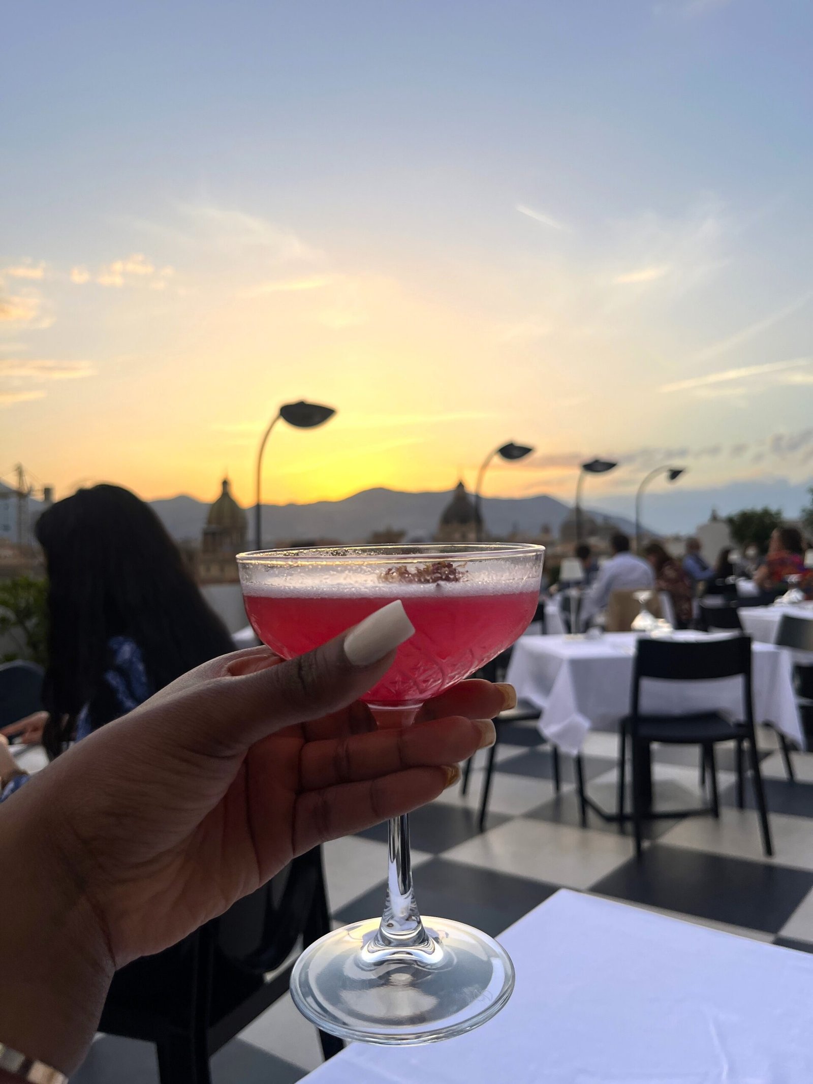 Pink Signature Cocktail at Sunset at Seven Restaurant in Palermo.