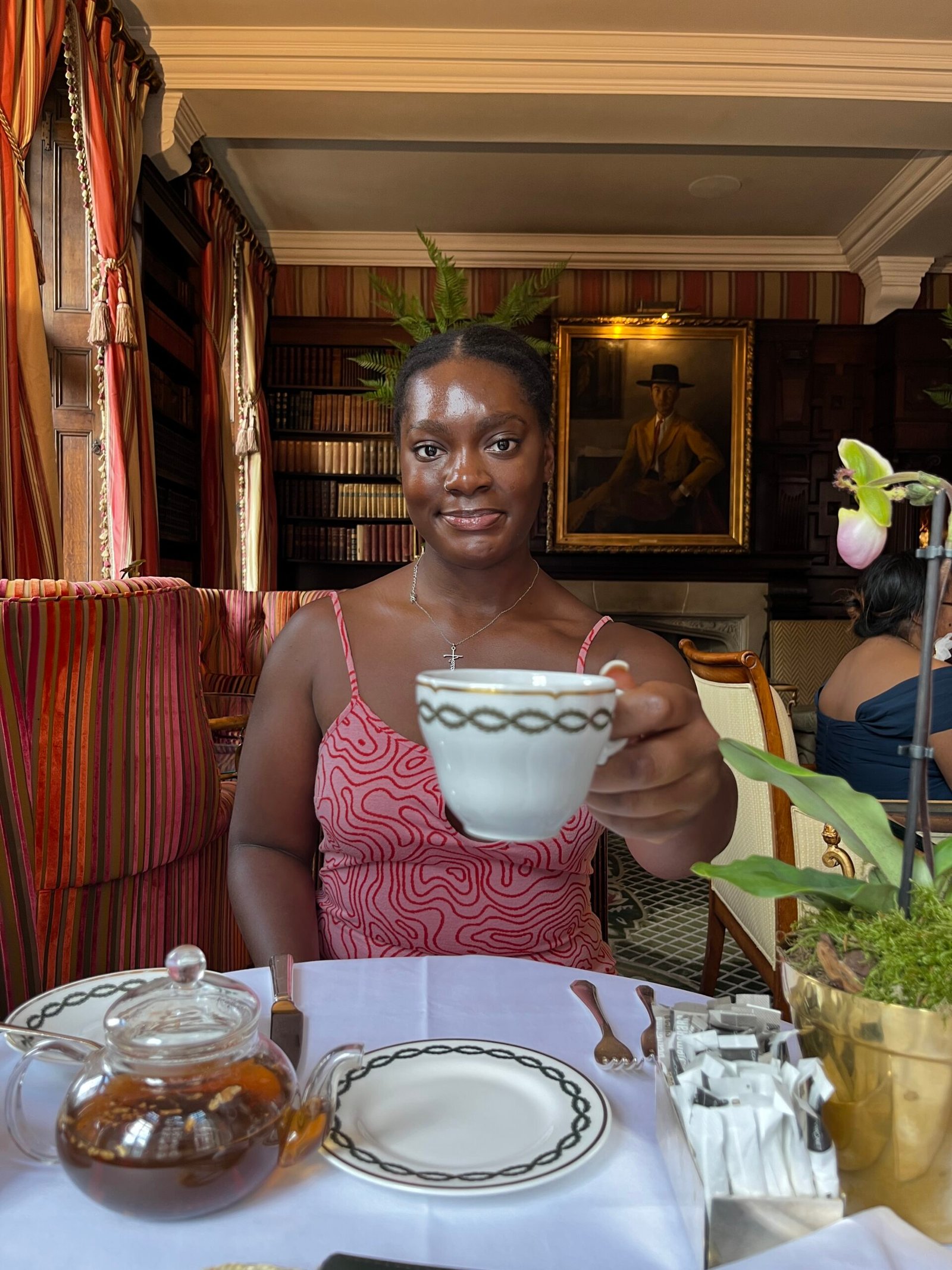 girl with tea cup in her hand