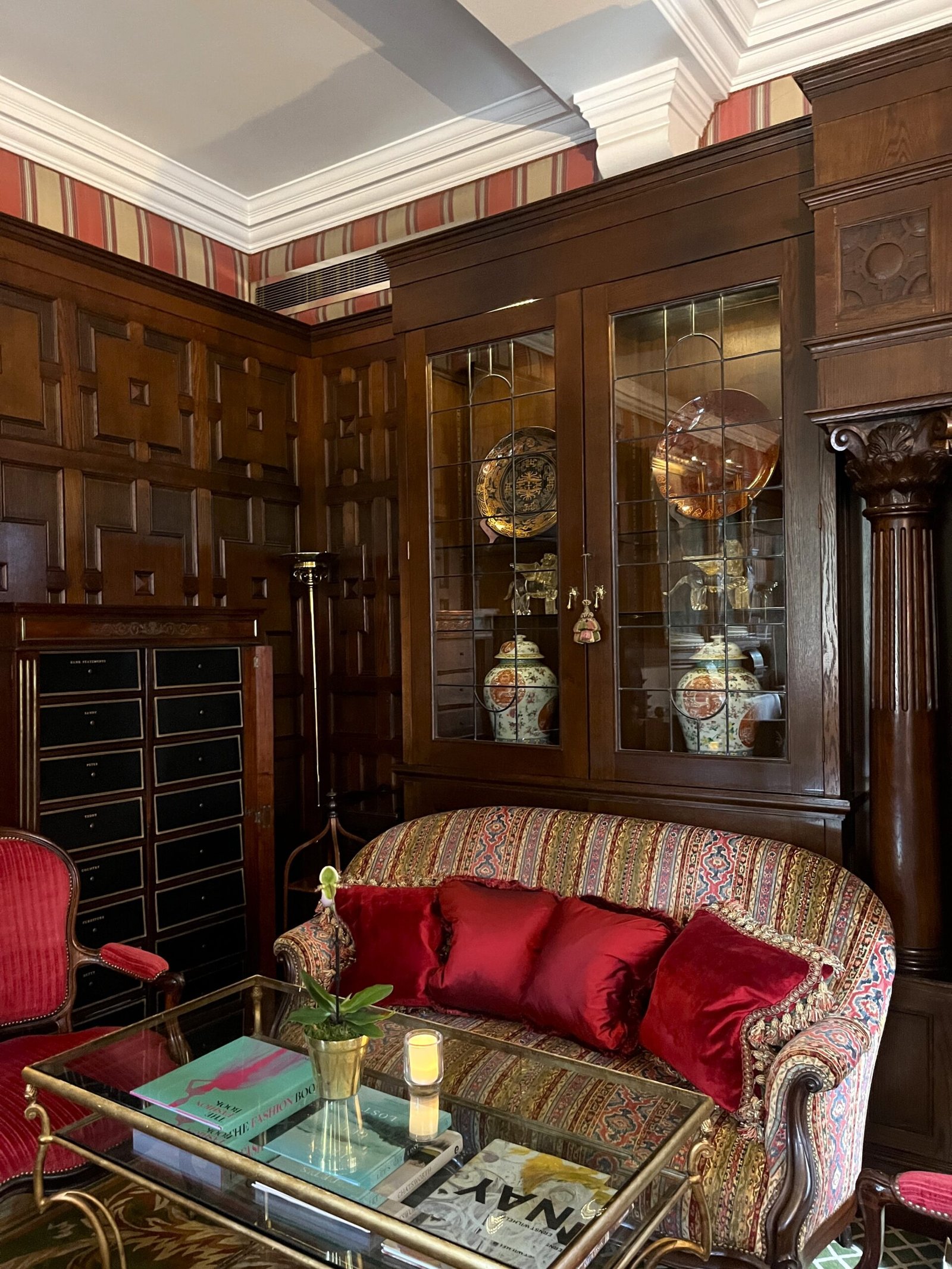 sofa and cabinet at The Milestone Hotel & Residences