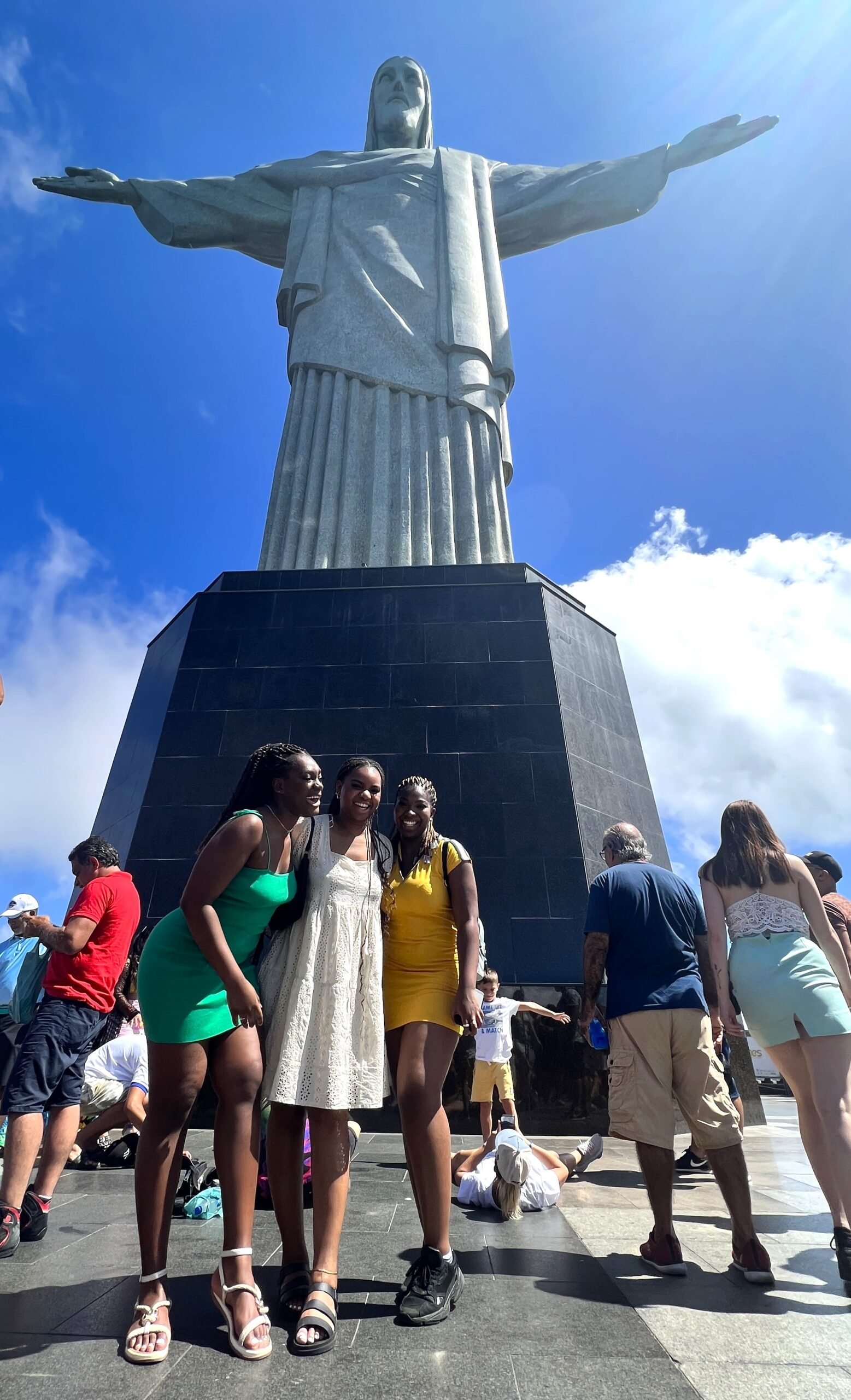 3 girls posing in front of christ the redeemer